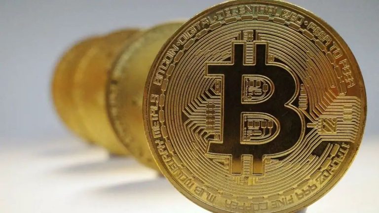 Bitcoin rises to record high over $70,000