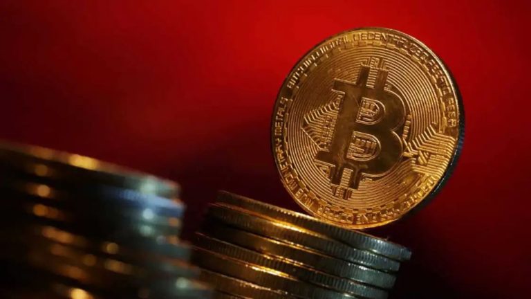 Bitcoin rises to record high over $70,000