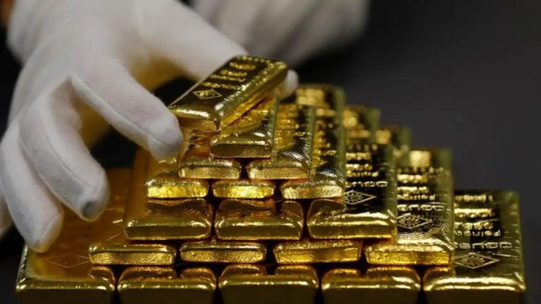 Gold hits record high on weak US data and banking jitters, Caution persists amid speculative rally