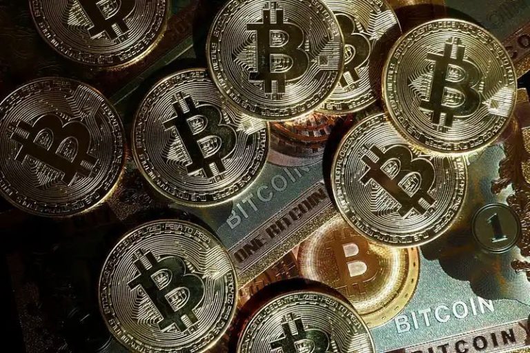 Bitcoin hits new record high above $70,400