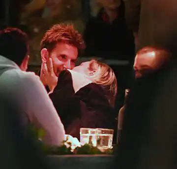 Bradley Cooper, Gigi Hadid spotted kissing while dining in NYC