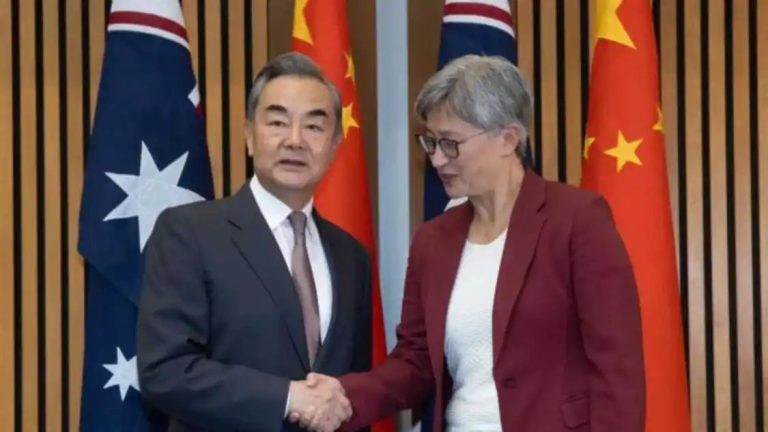 Australia tells visiting Chinese FM that Hong Kong reforms ‘erode rights’