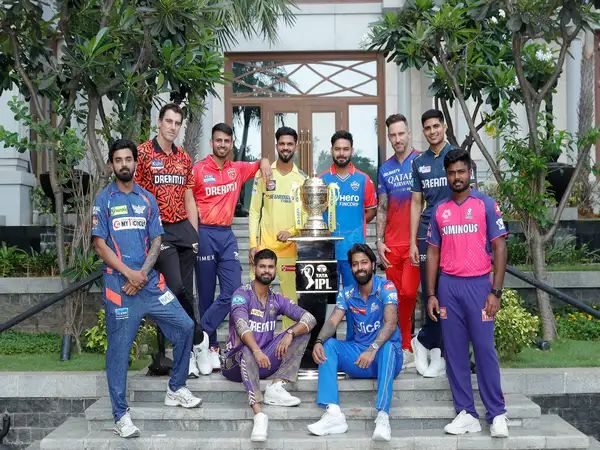 Team captains pose with trophy ahead of IPL season