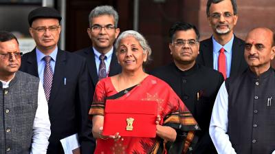 Sitharaman takes tablet in red pouch to Parliament to present paperless Budget