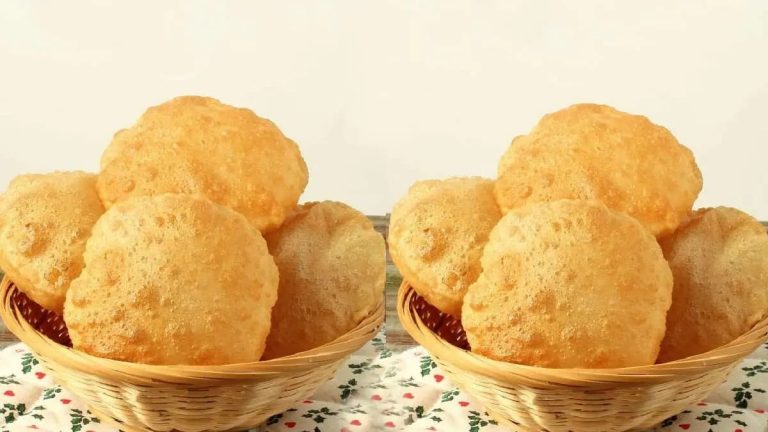 Recipe to make puffed soft puri, served with juicy vegetables