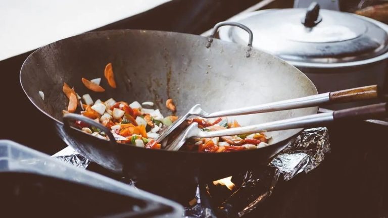 Where should iron utensils be kept in the kitchen