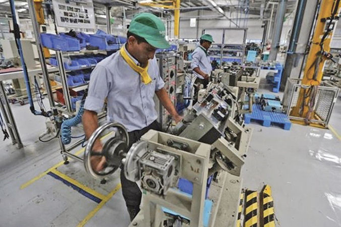 Manufacturing activity softens in April after reaching 16-year high in March