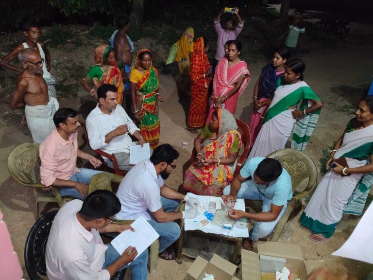 A health worker took a blood sample to test for filariasis