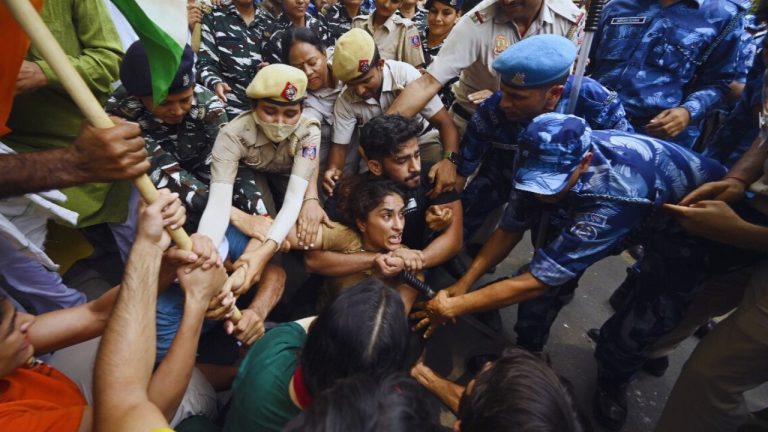 Why did Olympic medalist Vinesh Phogat clash with police in Delhi?